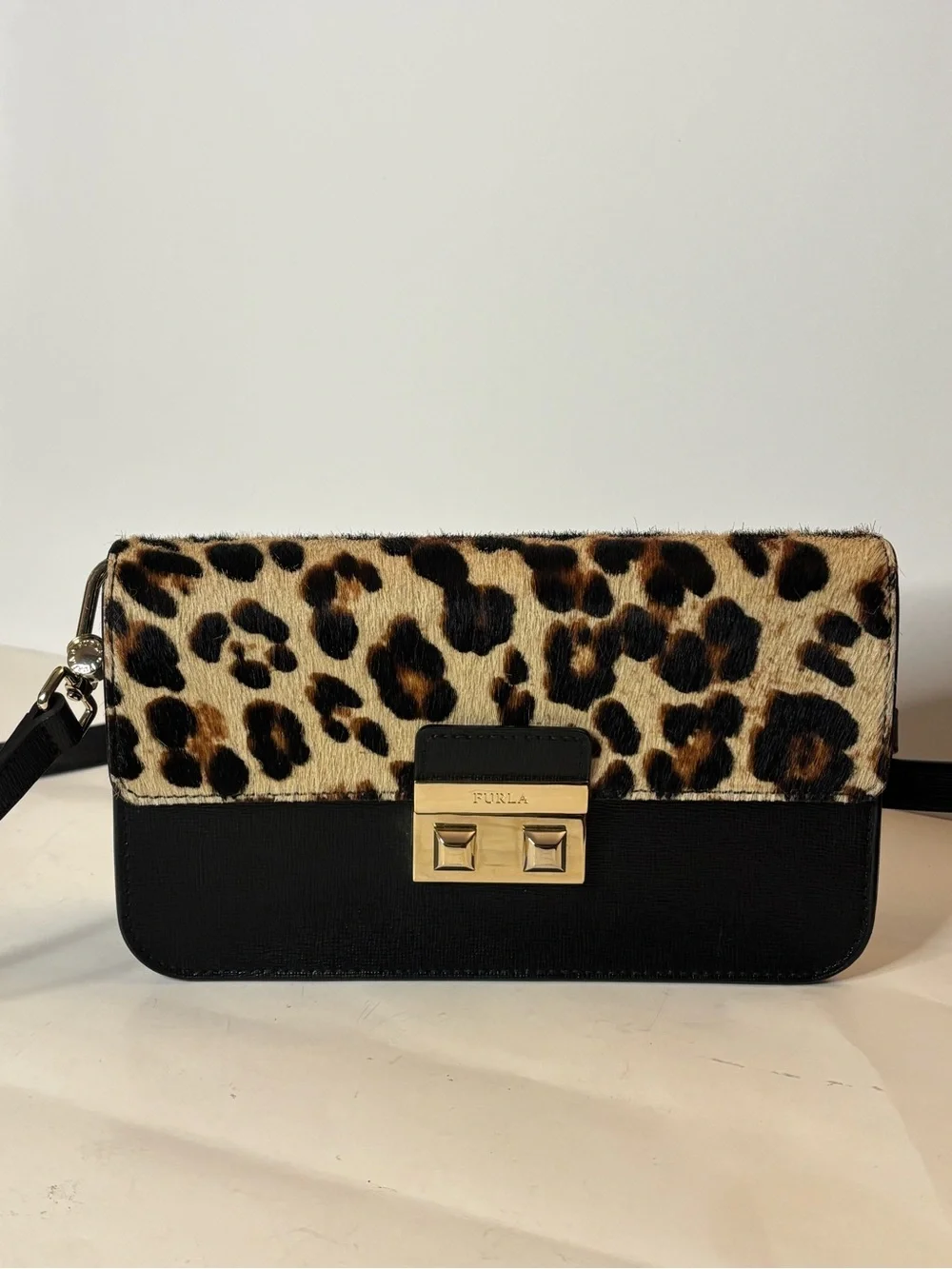Furla Bella mini crossbody with leopard print calf hair and leather. Adjustable